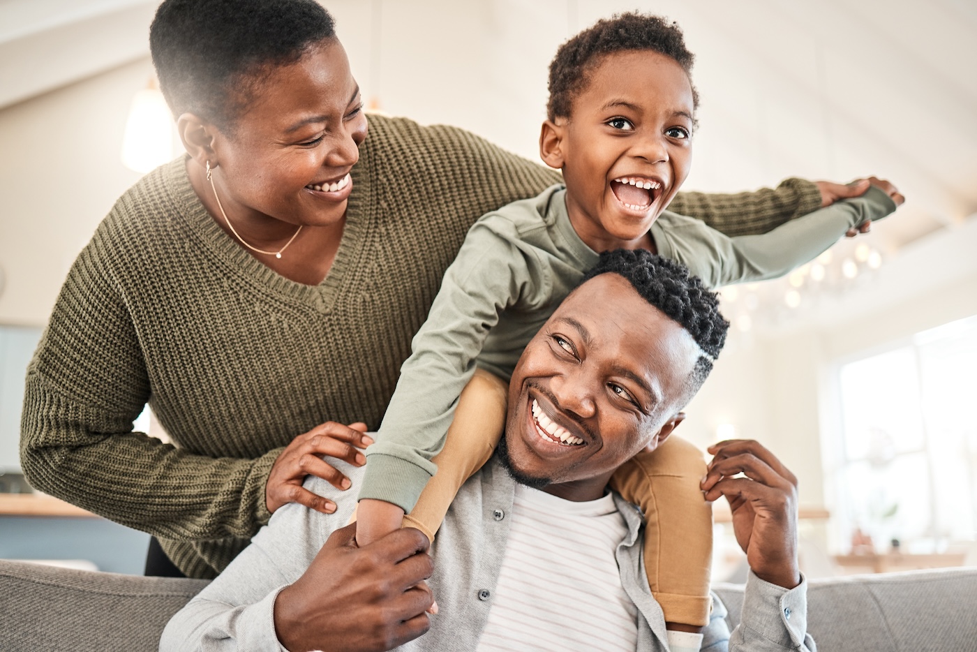 happy family relaxing in residential home